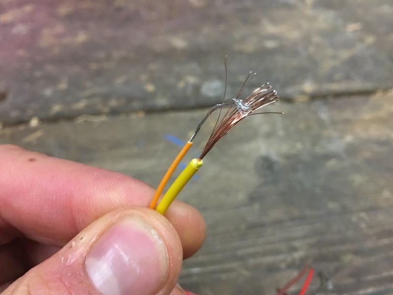 Bare wires place together before threading